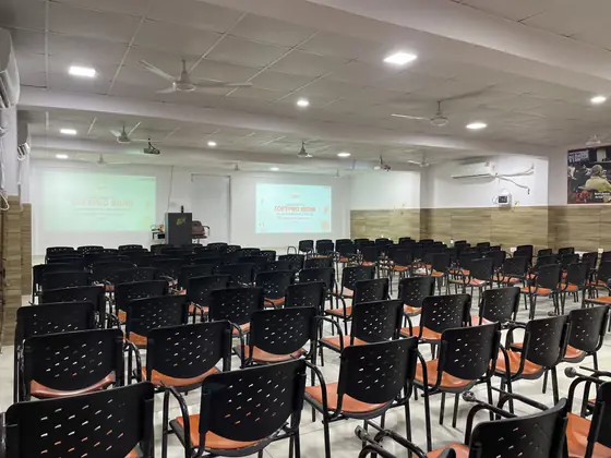 An empty auditorium with the SSS India title slide already on screen